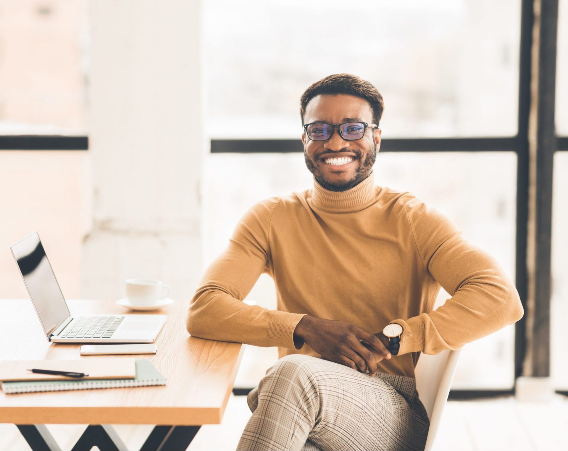 portrait-of-happy-black-manager-looking-at-camera-EAPQ4YL-scaled-e1589488586209.jpg